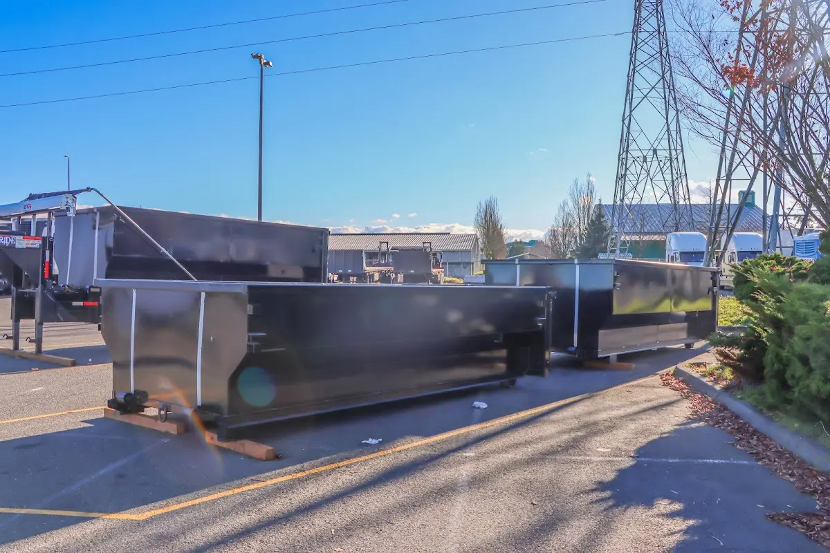 Roll-off dumpster ready for waste disposal at job site for 3 Yard Dumpster Rental in Woods Creek